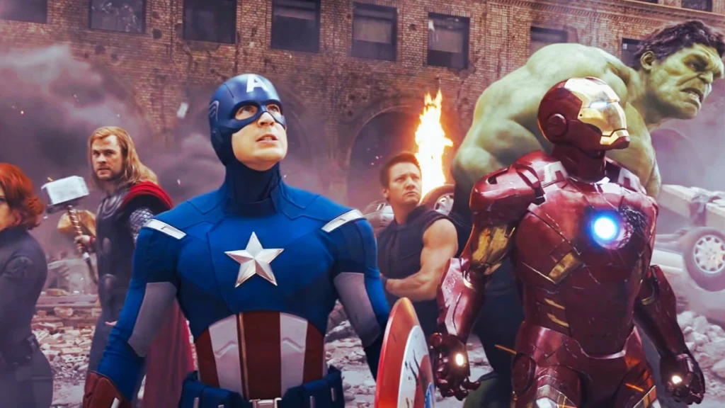 The Avengers assembling on a battlefield, showcasing their collaboration and diverse abilities, highlighting the role of teamwork in their shared success